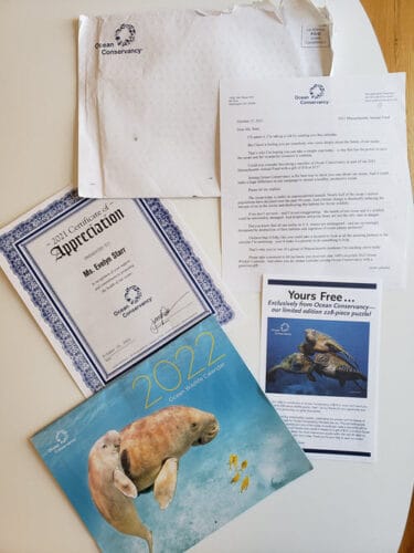 Ocean Conservatory marketing package with certificate, calendar, puzzle offer
