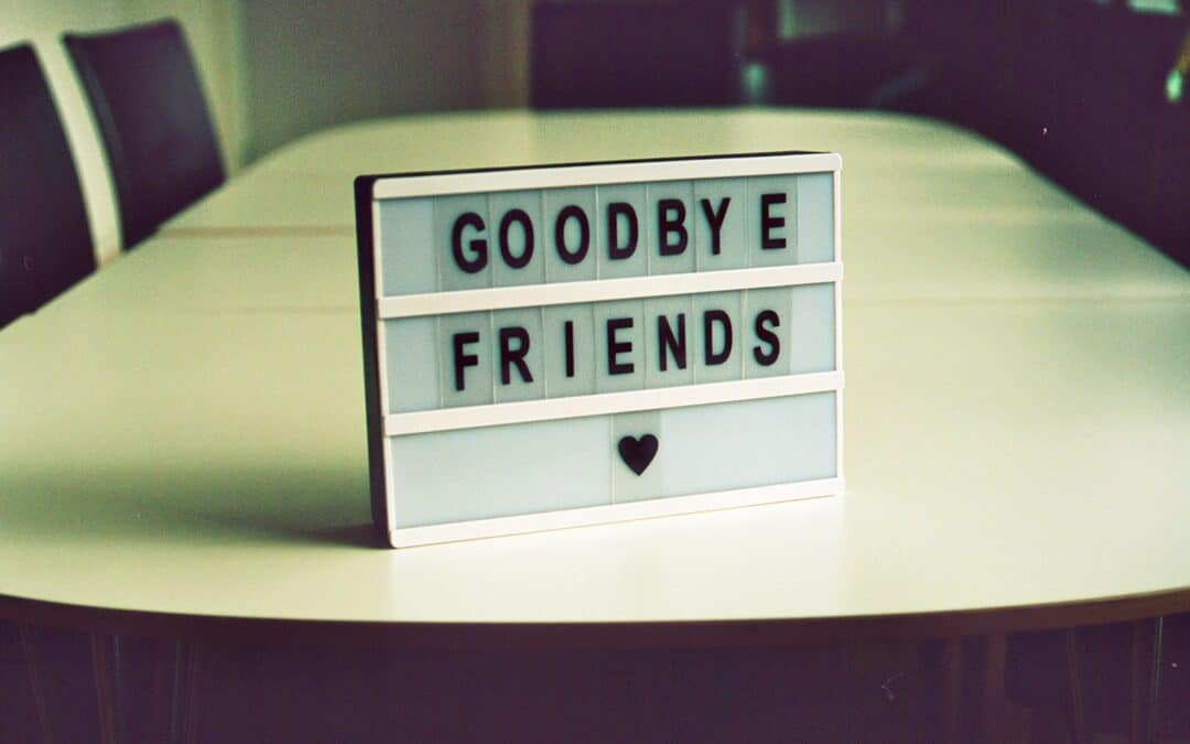 Photo by Jan Tinneberg on Unsplash sign on conference room table that says Goodbye Friends