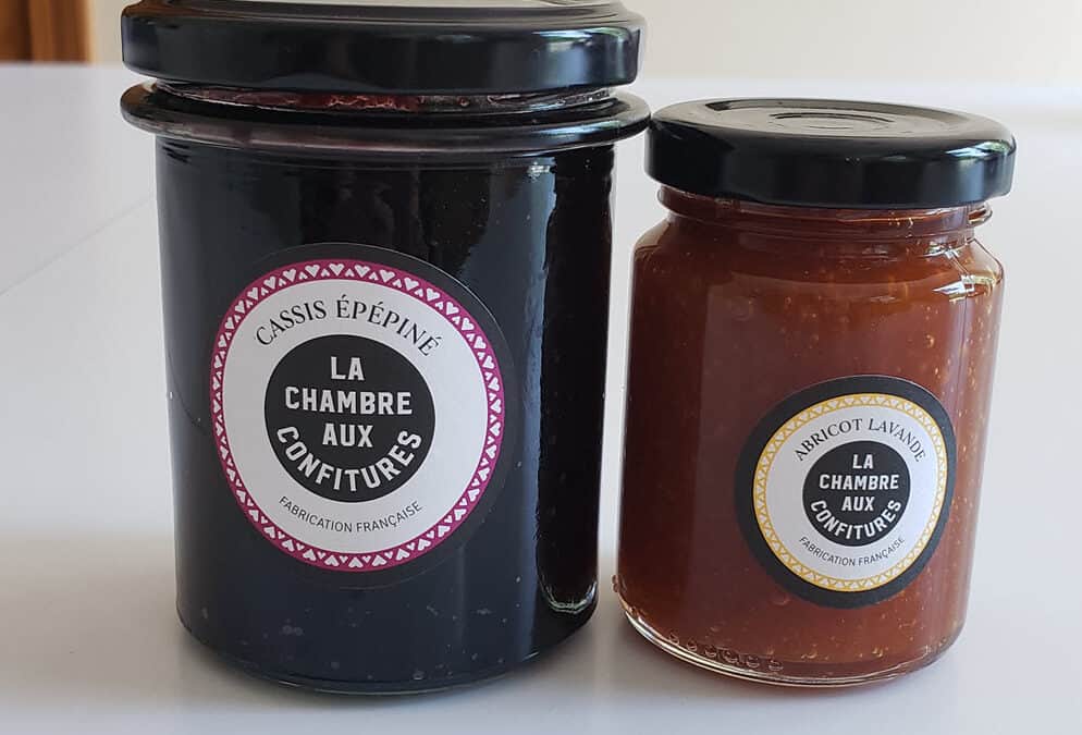 Make transacting easy - showing Two jars of jam, a larger one with purple jam inside with a white label with black writing that read La Chambre Aux Confitures cassis; a smaller jar with orangish jam inside and a white label with black writing that reads La Chambre Aux Confitures Abricot Lavande